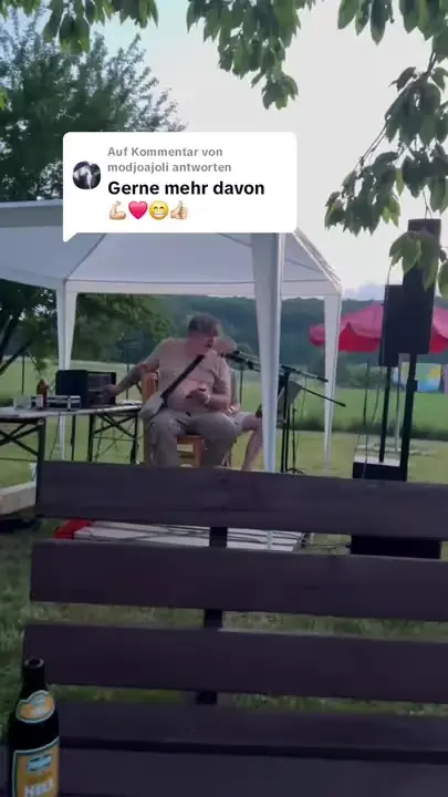 Still: Marko playing live under a gazebo in a garden